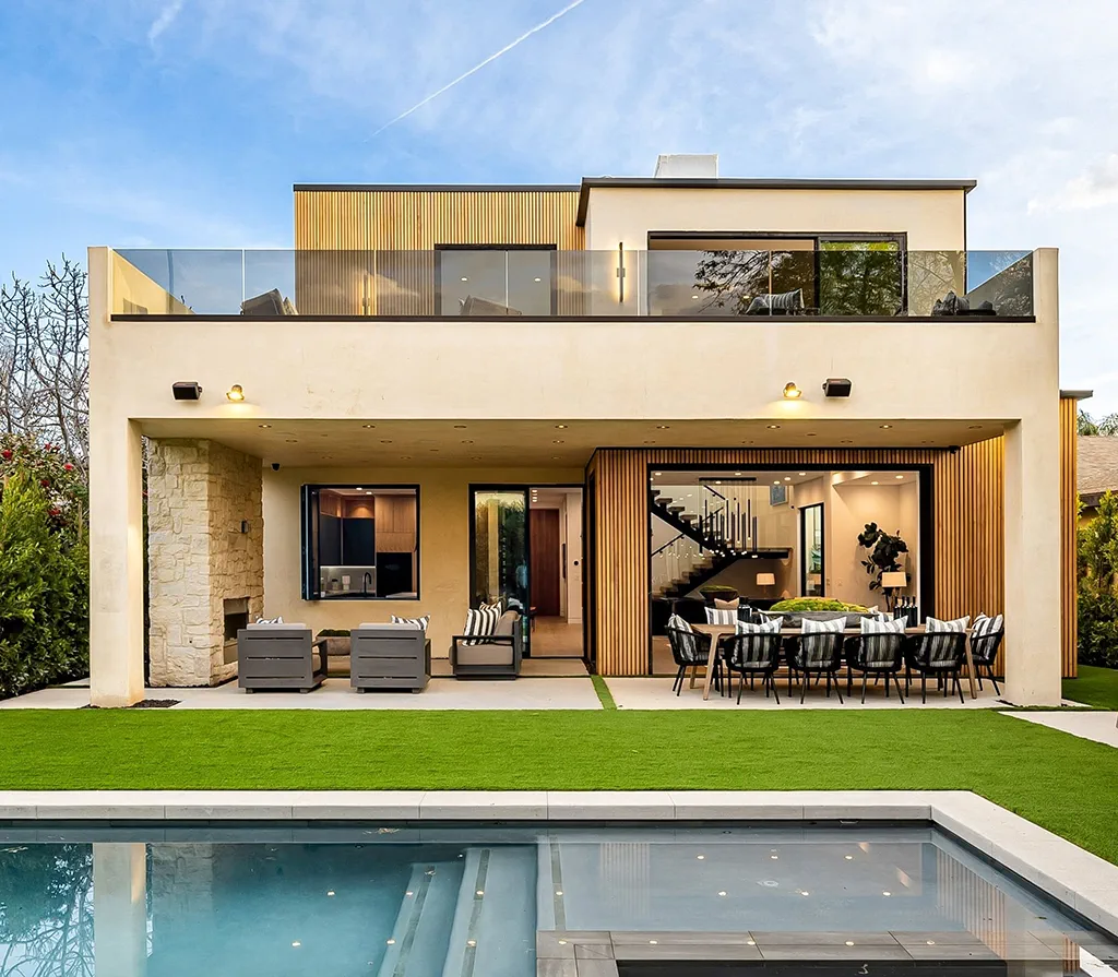 Extension à toit plat avec terrasse accessible servant d’espace de vie extérieur